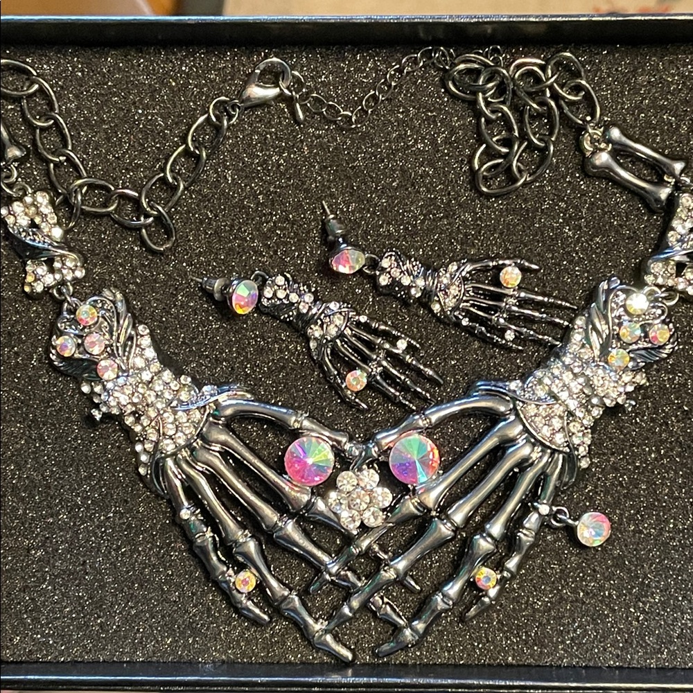 Elegant Skeleton Hand Necklace - Silver